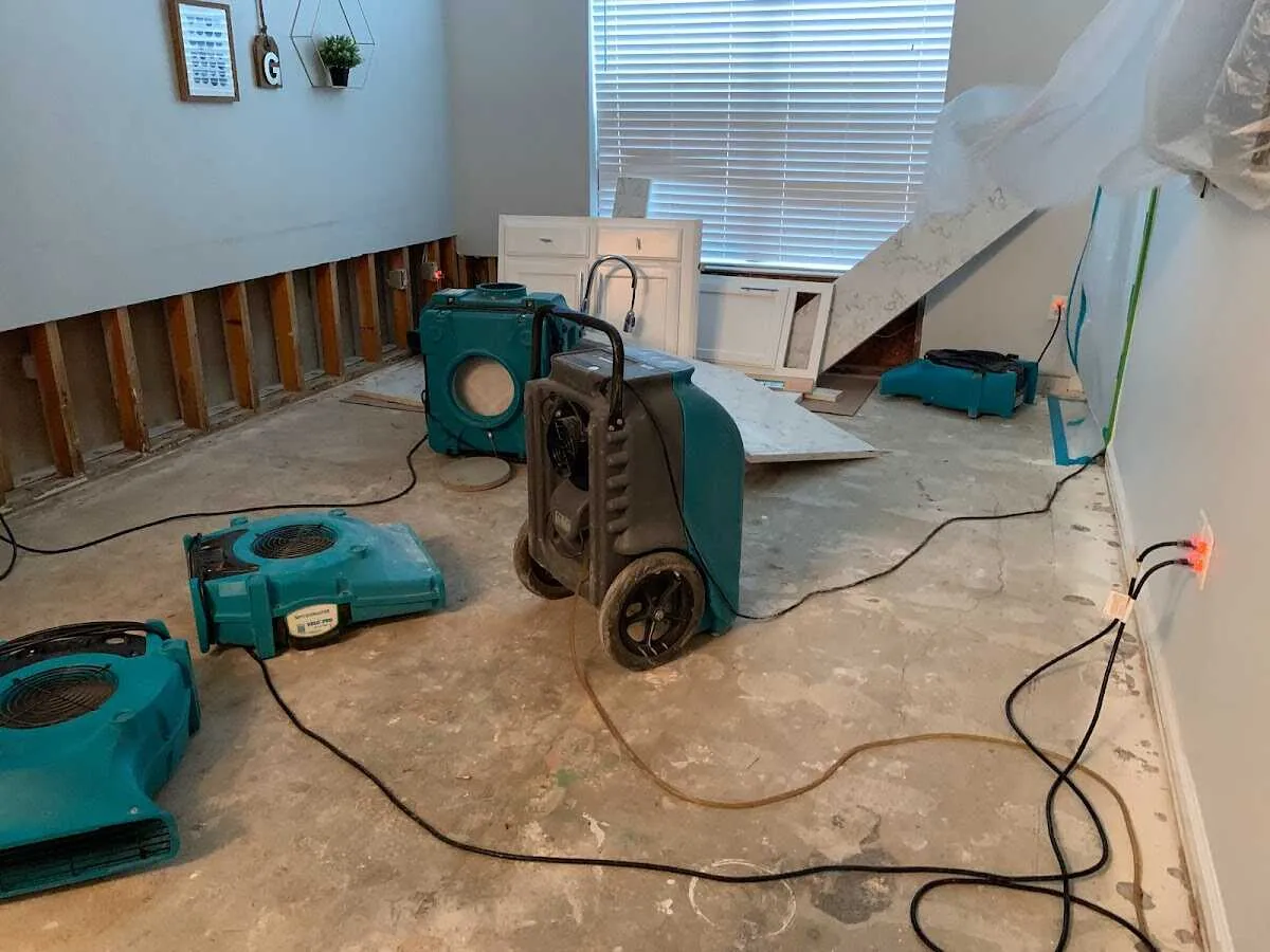 Dehumidifier in flood-cut room for Water Damage Restoration in New Philadelphia